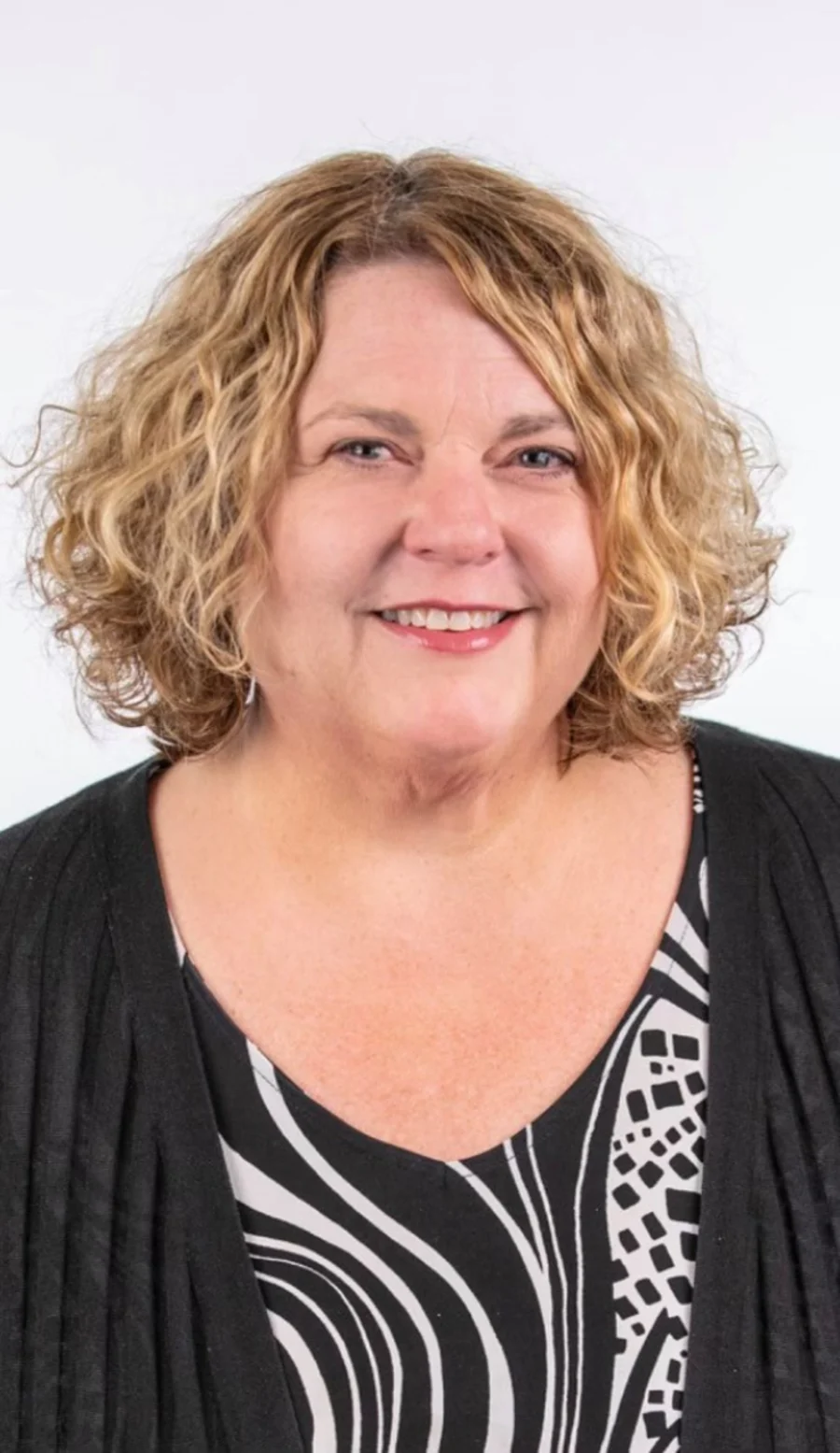 Andrea Wetzel, owner and principal designer of Cricket on the Hearth Staging & Design