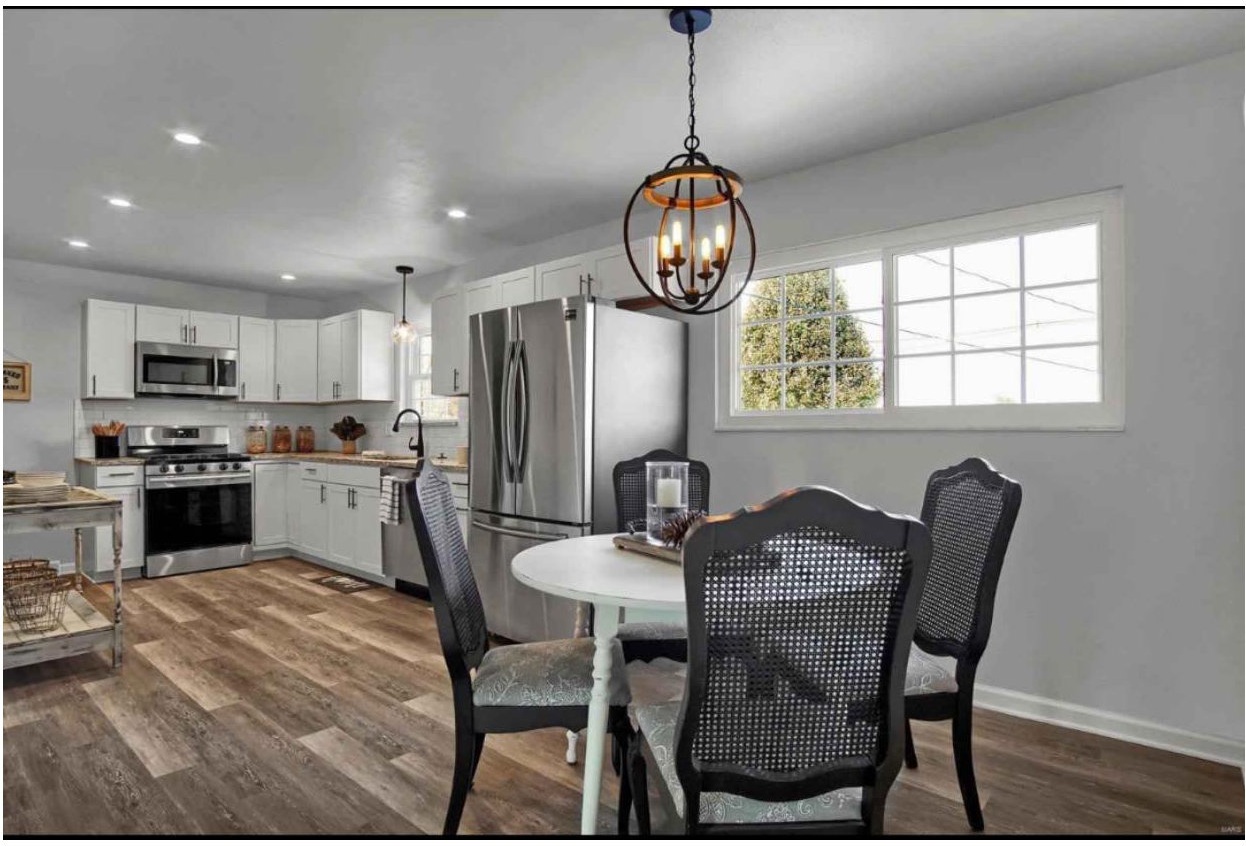 Vacant staging, Brookshire new build: kitchen and dining area staged under a lantern pendant